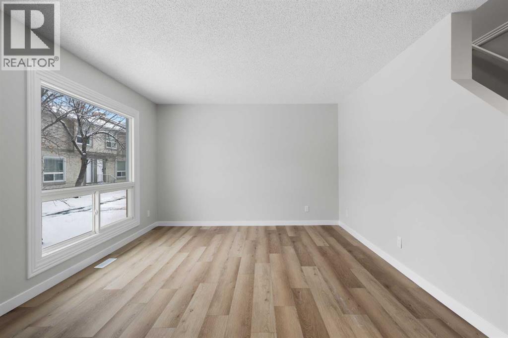 129 Deer Ridge Lane Se, Calgary, Alberta  T2J 6N3 - Photo 6 - A2274492