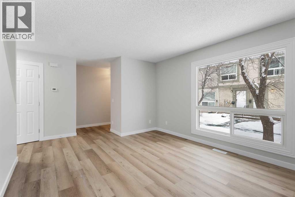 129 Deer Ridge Lane Se, Calgary, Alberta  T2J 6N3 - Photo 5 - A2274492