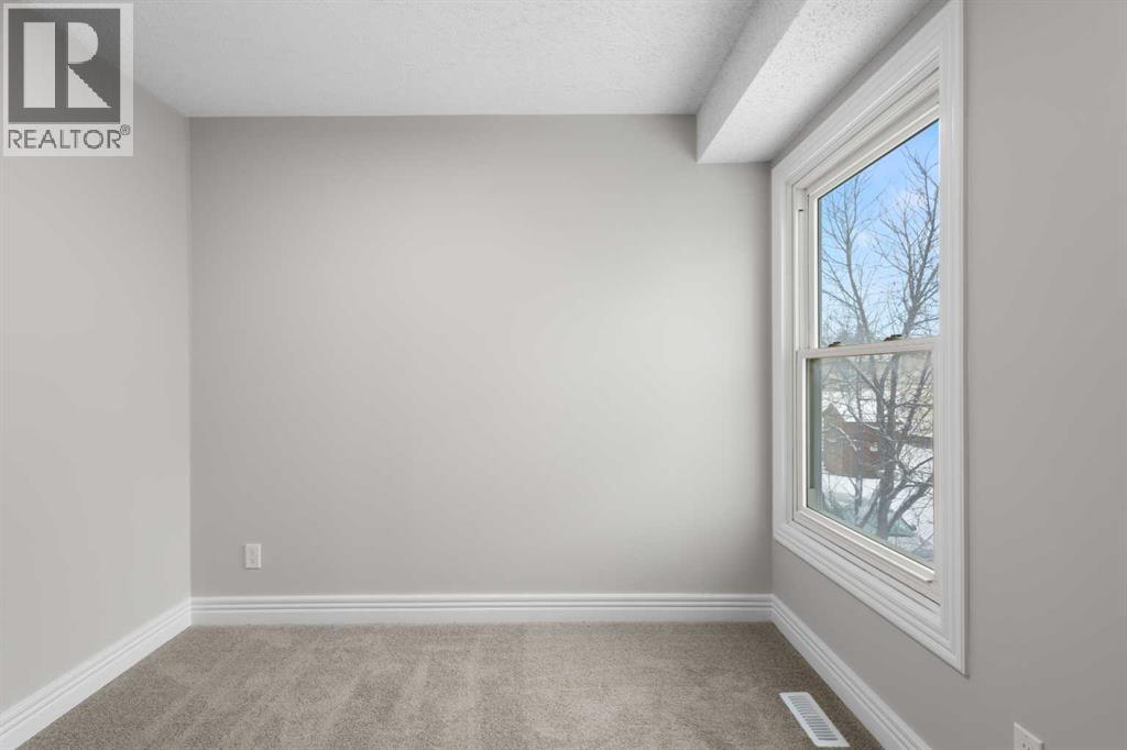 129 Deer Ridge Lane Se, Calgary, Alberta  T2J 6N3 - Photo 20 - A2274492