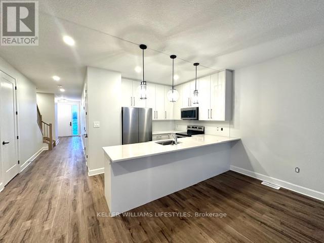 233 - 175 Doan Drive, Middlesex Centre, Ontario  N0L 1R0 - Photo 3 - X12642138