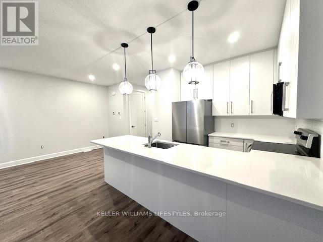 233 - 175 Doan Drive, Middlesex Centre, Ontario  N0L 1R0 - Photo 4 - X12642138