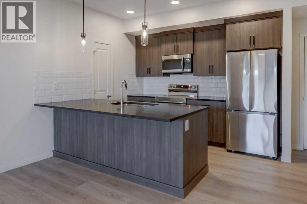 Calgary Apartment for sale:  2 bedroom 902 sq.ft. (Listed 2025-12-18)