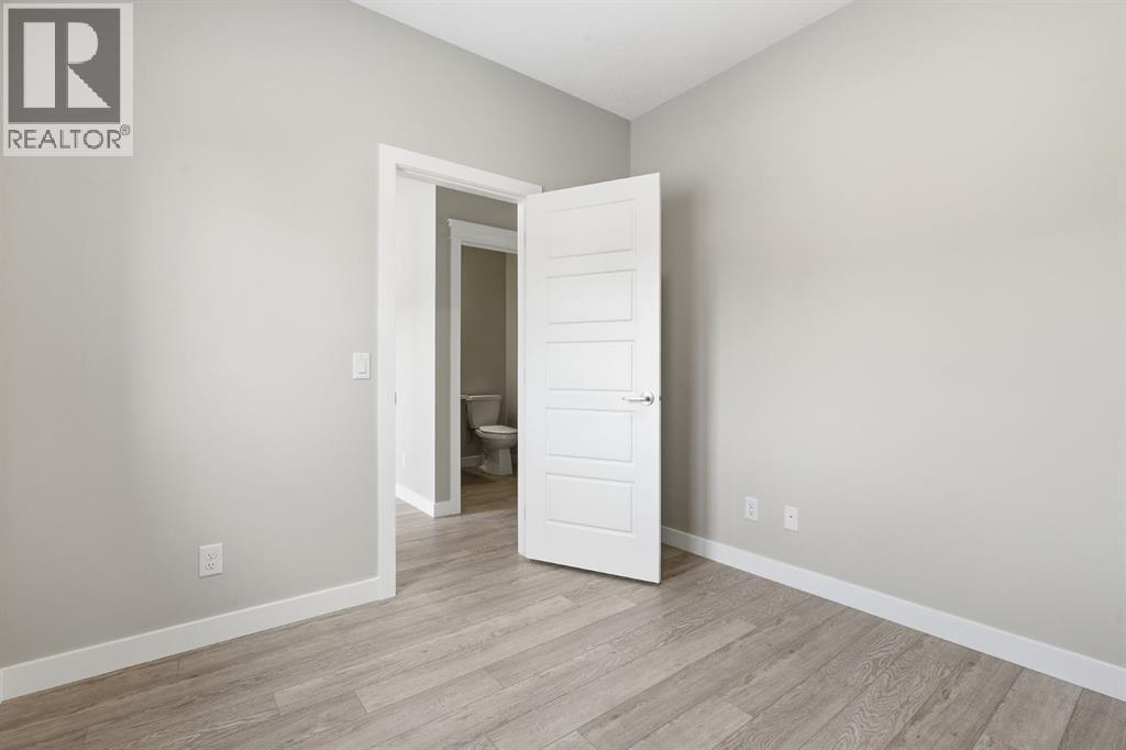 936 Reynolds Lane Sw, Airdrie, Alberta  T4B 5L7 - Photo 19 - A2274664