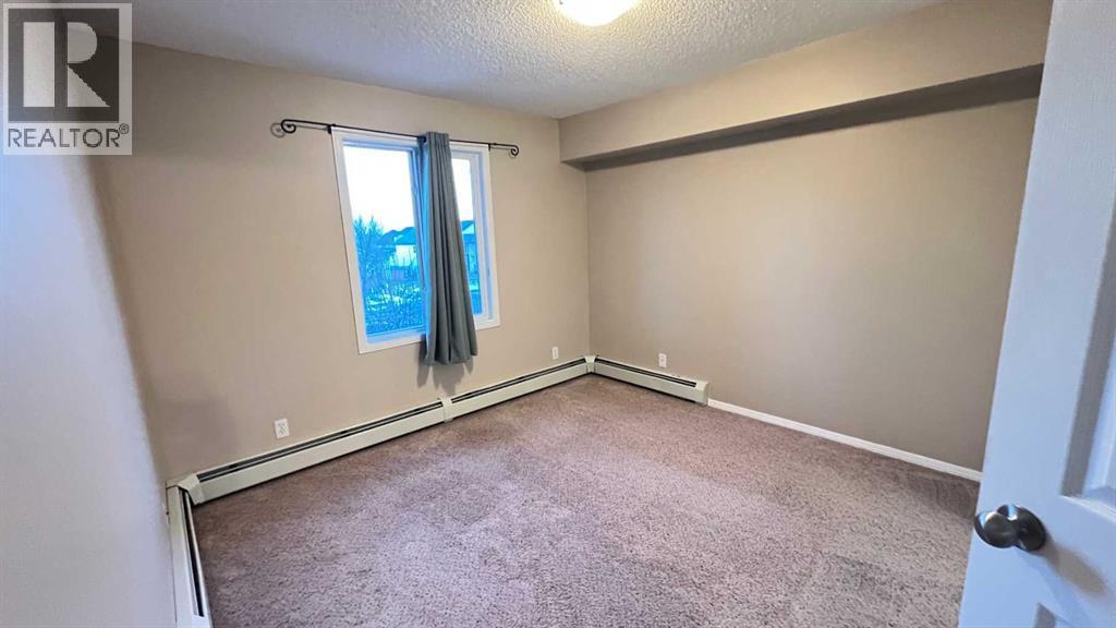 1208, 12 Cimarron Common, Okotoks, Alberta  T1S 2G1 - Photo 11 - A2275525