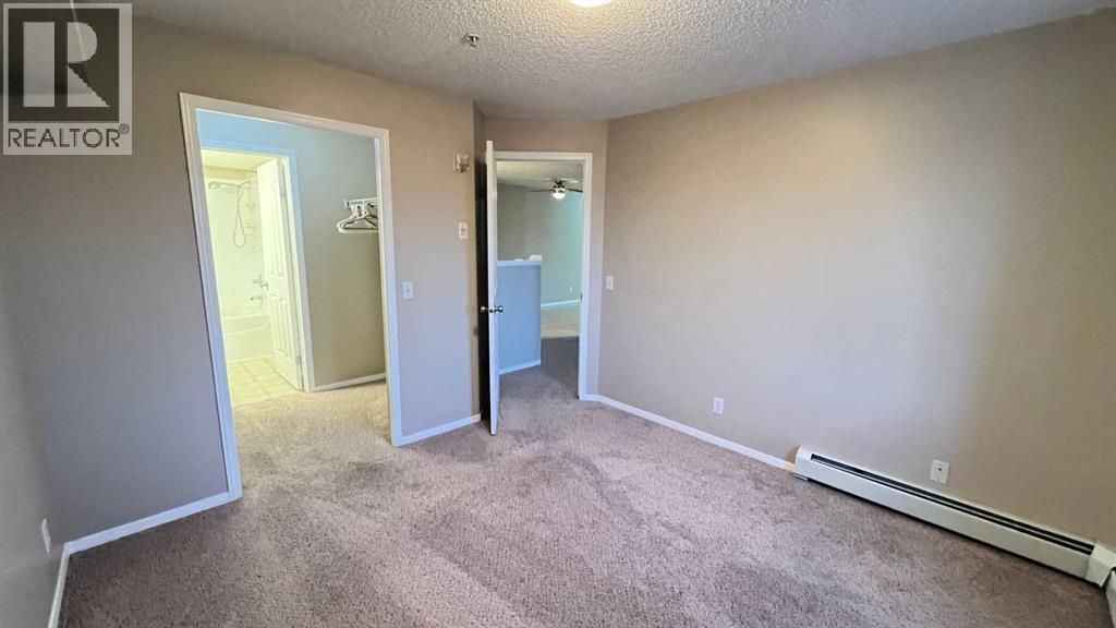 1208, 12 Cimarron Common, Okotoks, Alberta  T1S 2G1 - Photo 12 - A2275525
