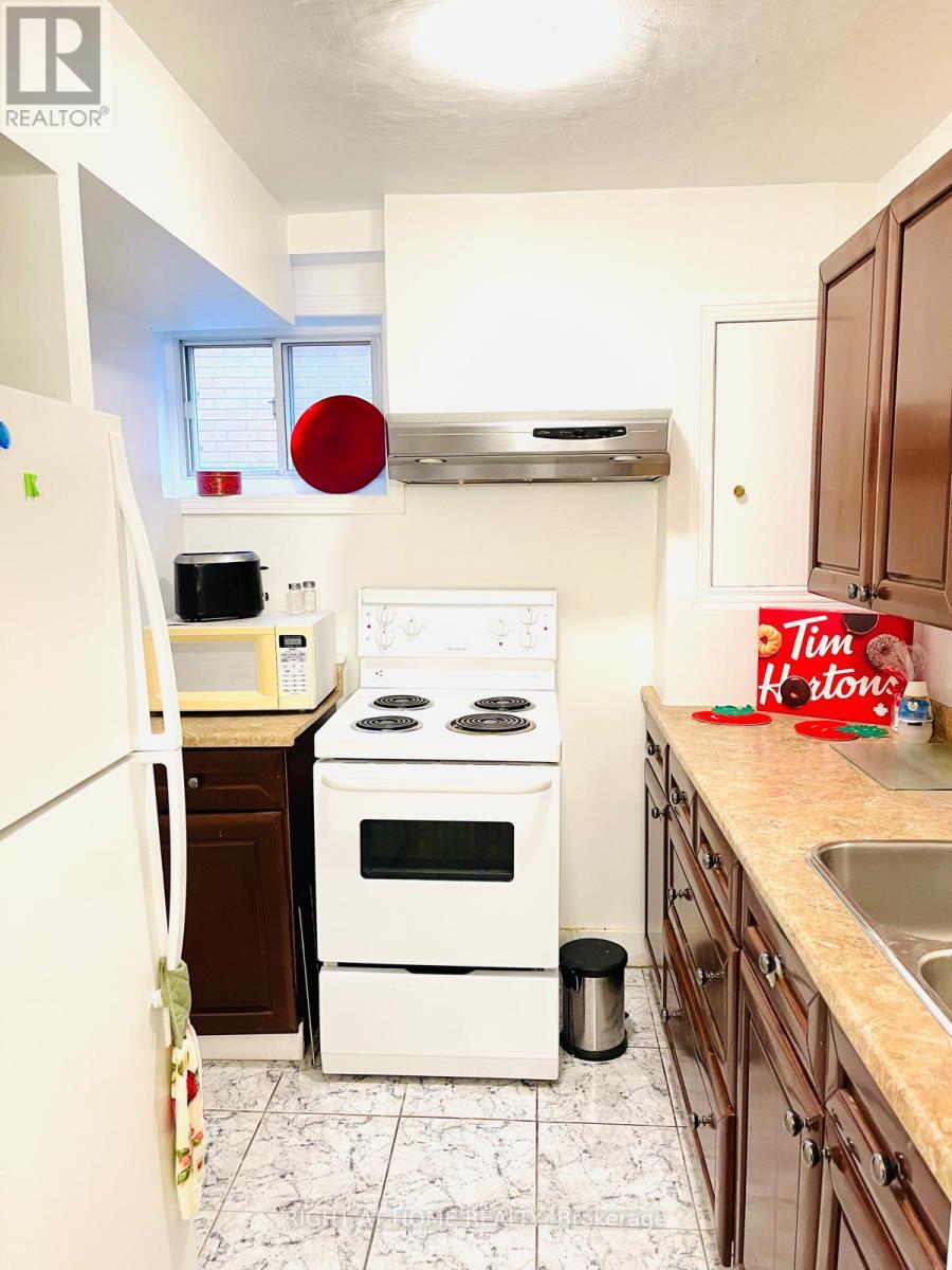 A - 73 Twenty Fourth Bsmt Street, Toronto, Ontario  M8V 3N7 - Photo 2 - W12642232