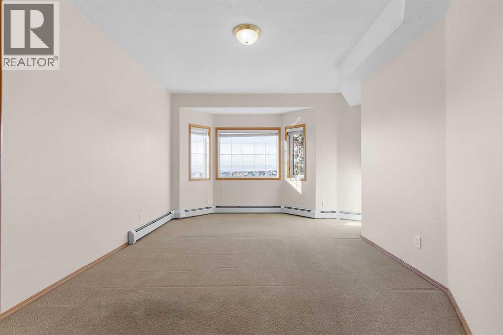 314, 223 Tuscany Springs Boulevard Nw, Calgary, Alberta  T3L 3M2 - Photo 21 - A2274708