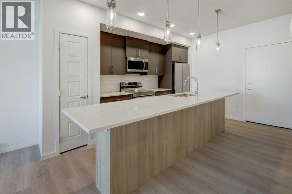 219, 245 Edith Place Nw, Calgary, Alberta  T3R 2C9 - Photo 7 - A2275303