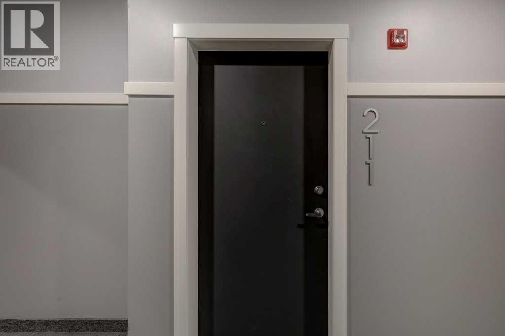 211, 245 Edith Place Nw, Calgary, Alberta  T3R 2C9 - Photo 4 - A2275304