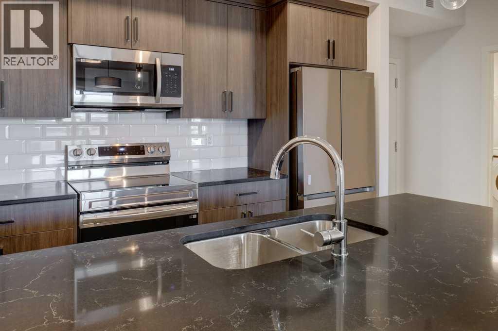 211, 245 Edith Place Nw, Calgary, Alberta  T3R 2C9 - Photo 9 - A2275304