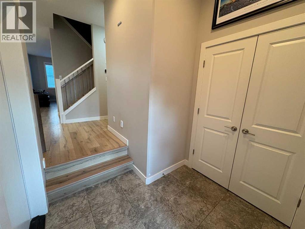 2, 77 Aquitania Circle W, Lethbridge, Alberta  T1J 5M5 - Photo 2 - A2258936