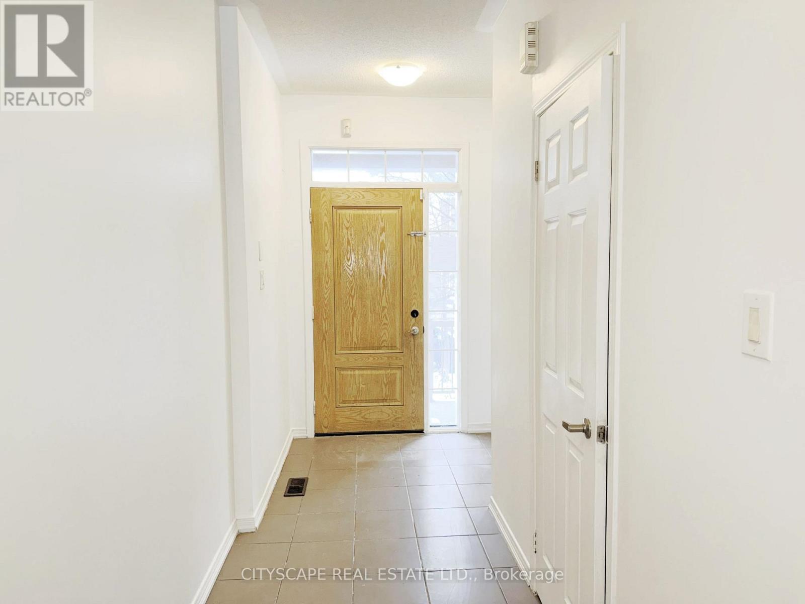 64 Honeyview Trail, Brampton, Ontario  L6P 4A4 - Photo 3 - W12642370