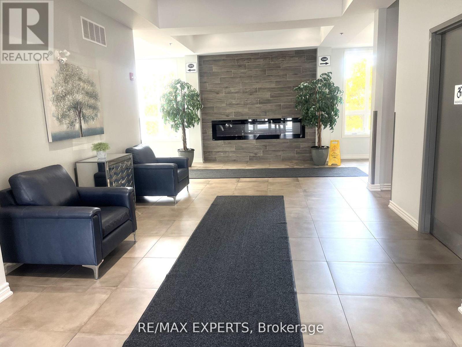 303 - 1360 Costigan Road, Milton, Ontario  L9T 8X6 - Photo 2 - W12642538