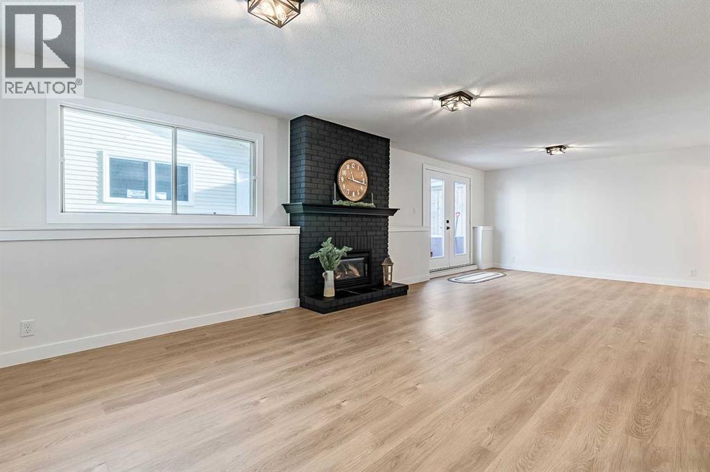 15 Woodford Crescent Sw, Calgary, Alberta  T2W 4C5 - Photo 22 - A2272502