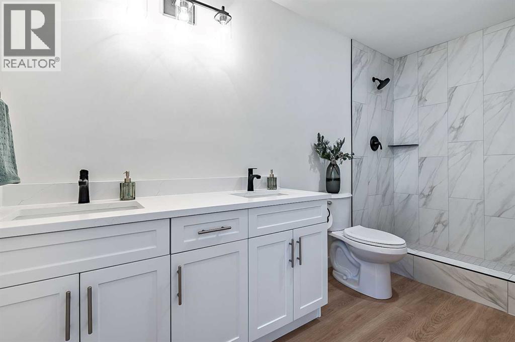 15 Woodford Crescent Sw, Calgary, Alberta  T2W 4C5 - Photo 13 - A2272502