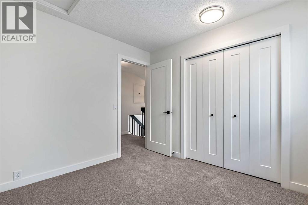 15 Woodford Crescent Sw, Calgary, Alberta  T2W 4C5 - Photo 19 - A2272502