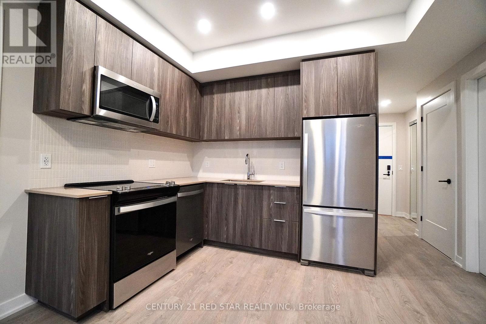 417 - 720 Whitlock Avenue, Milton, Ontario  L9E 2B5 - Photo 10 - W12642806