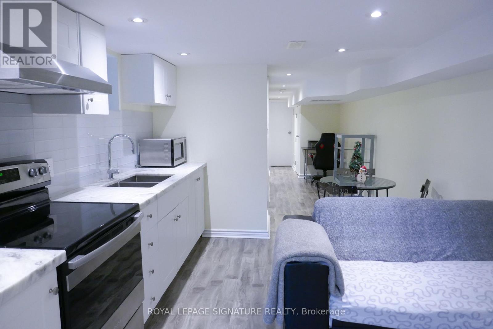 Lower - 47 Boon Avenue, Toronto, Ontario  M6E 3Z2 - Photo 2 - W12642966