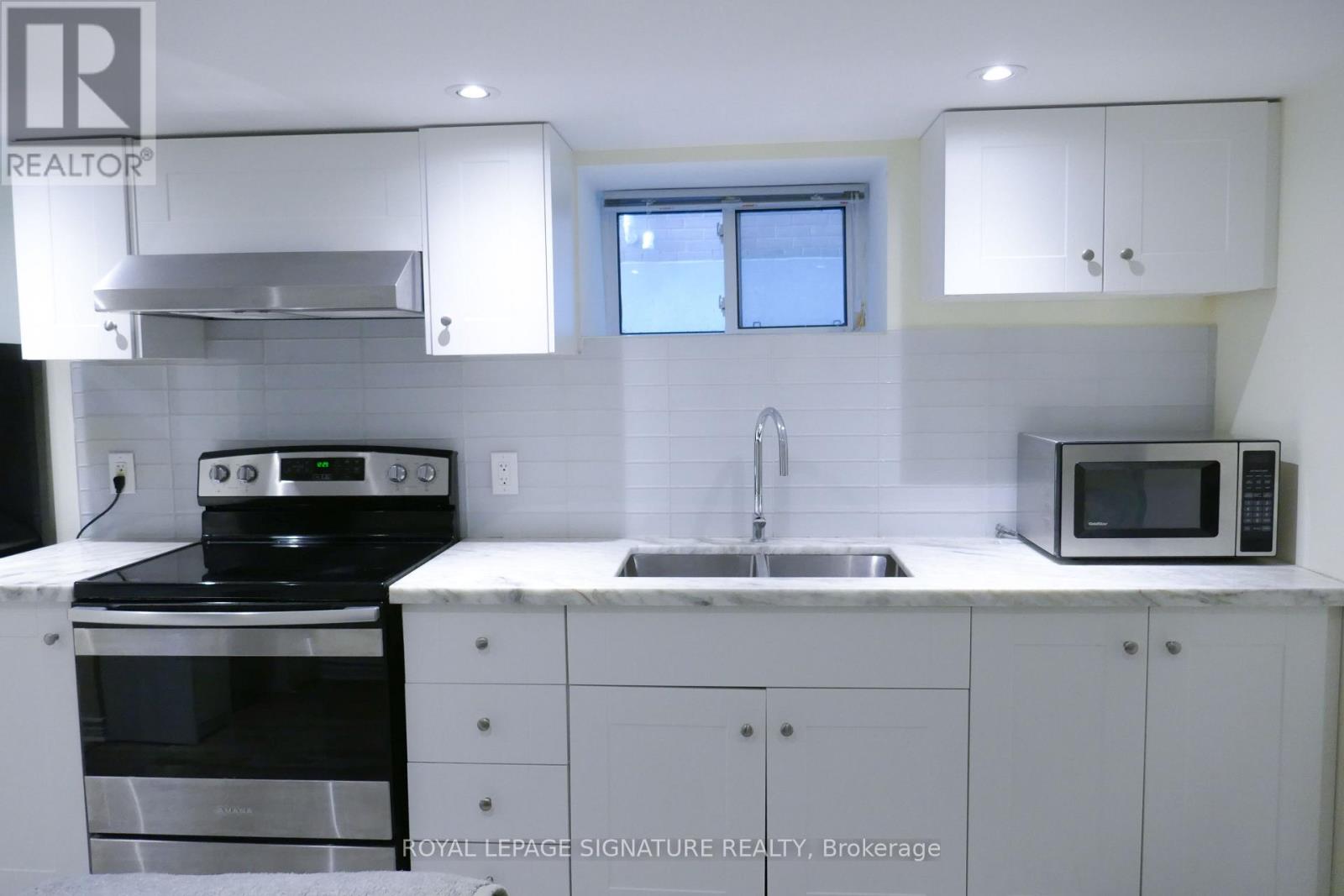 Lower - 47 Boon Avenue, Toronto, Ontario  M6E 3Z2 - Photo 3 - W12642966