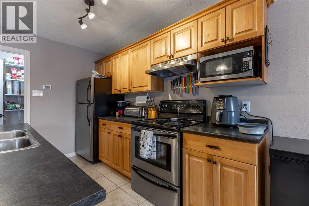 4, 1701 St Edward Boulevard N, Lethbridge, Alberta  T1H 1X2 - Photo 12 - A2272580