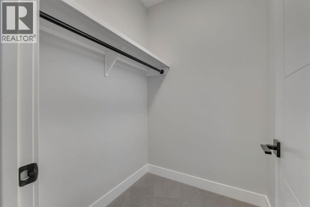 12 Spring Creek Point Sw, Calgary, Alberta  T3H 6E2 - Photo 32 - A2275769