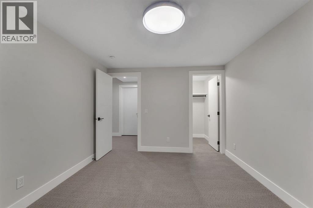 12 Spring Creek Point Sw, Calgary, Alberta  T3H 6E2 - Photo 39 - A2275769