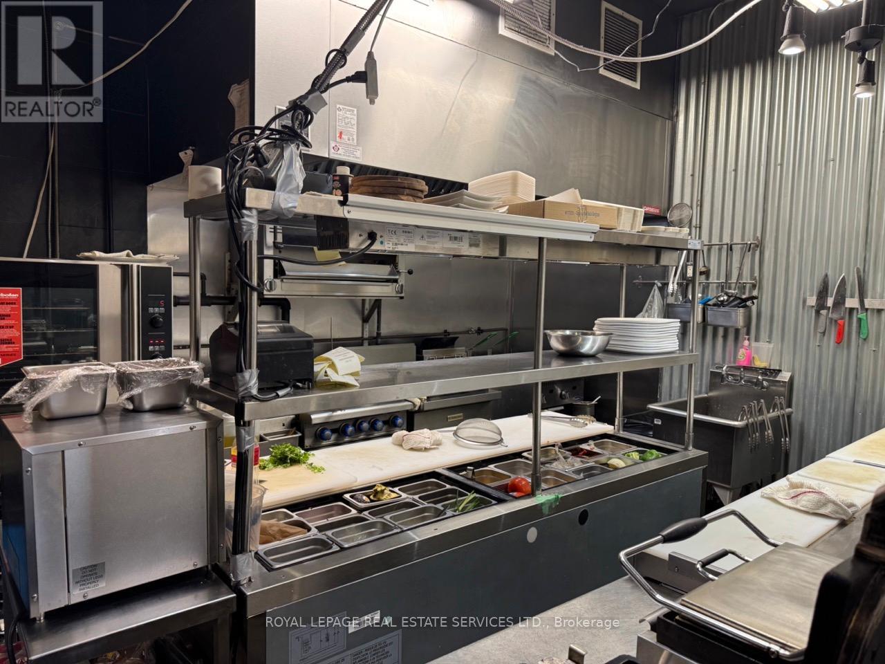 2014 Queen Street E, Toronto, Ontario  M4L 1J3 - Photo 2 - E12643234