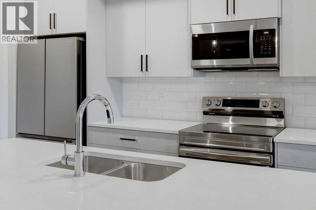 409, 245 Edith Place Nw, Calgary, Alberta  T3R 2C9 - Photo 8 - A2275300