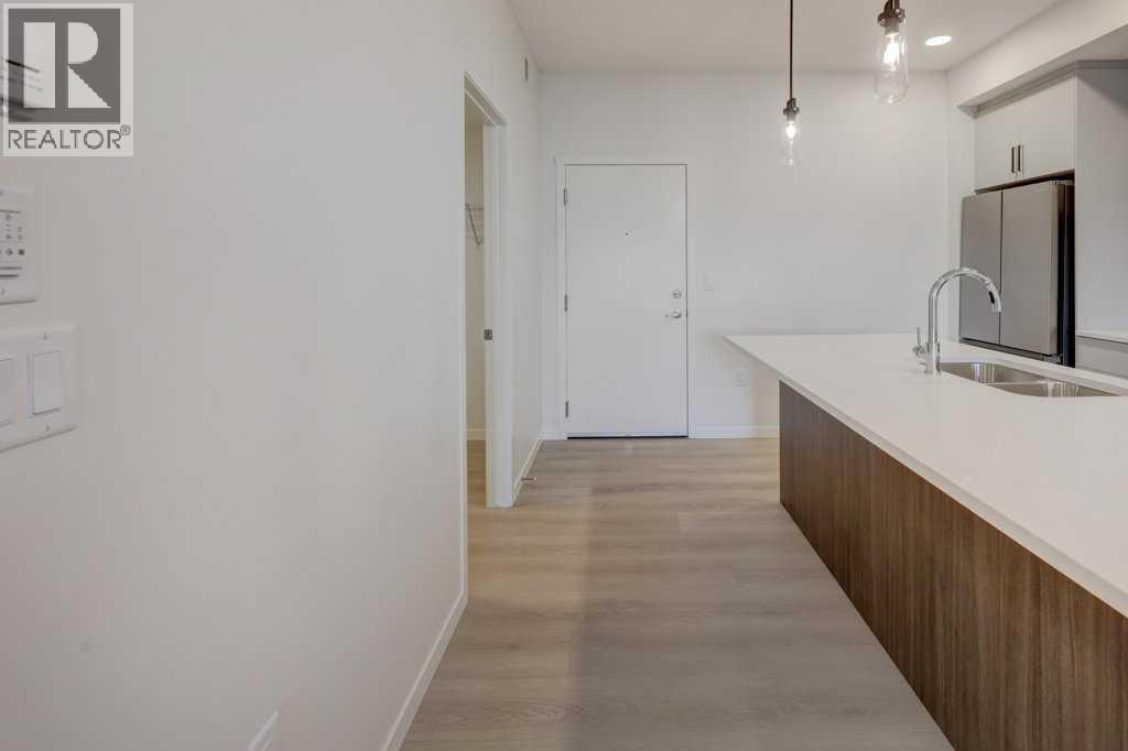 409, 245 Edith Place Nw, Calgary, Alberta  T3R 2C9 - Photo 5 - A2275300