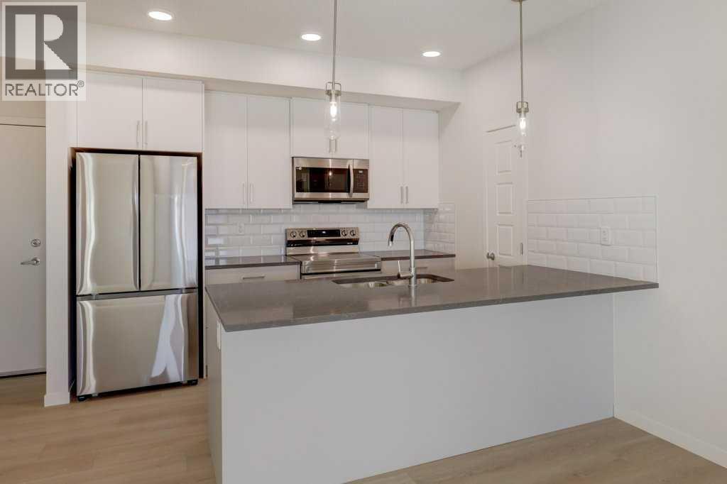 124, 245 Edith Place Nw, Calgary, Alberta  T3R 2C9 - Photo 6 - A2275305