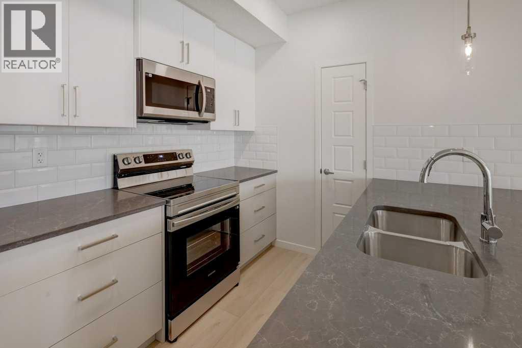 124, 245 Edith Place Nw, Calgary, Alberta  T3R 2C9 - Photo 8 - A2275305