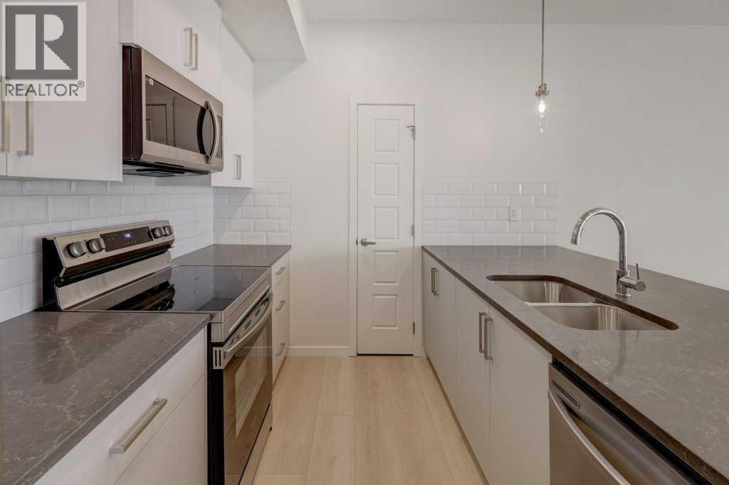 124, 245 Edith Place Nw, Calgary, Alberta  T3R 2C9 - Photo 10 - A2275305