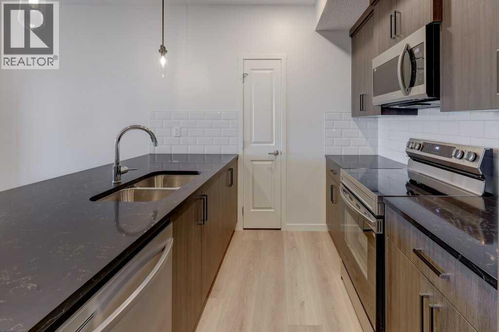 211, 245 Edith Place Nw, Calgary, Alberta  T3R 2C9 - Photo 10 - A2275304