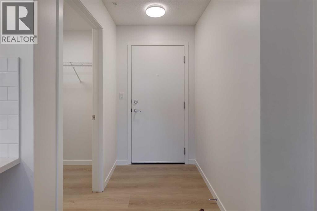 118, 245 Edith Place Nw, Calgary, Alberta  T3R 2C9 - Photo 5 - A2275306