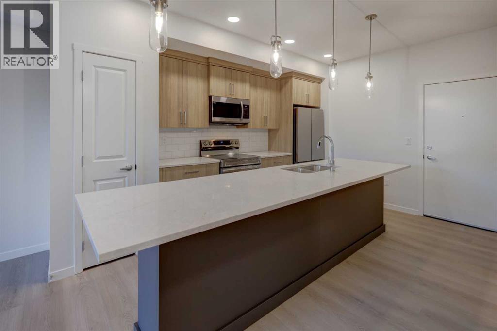 119, 245 Edith Place Nw, Calgary, Alberta  T3R 2C9 - Photo 8 - A2275307