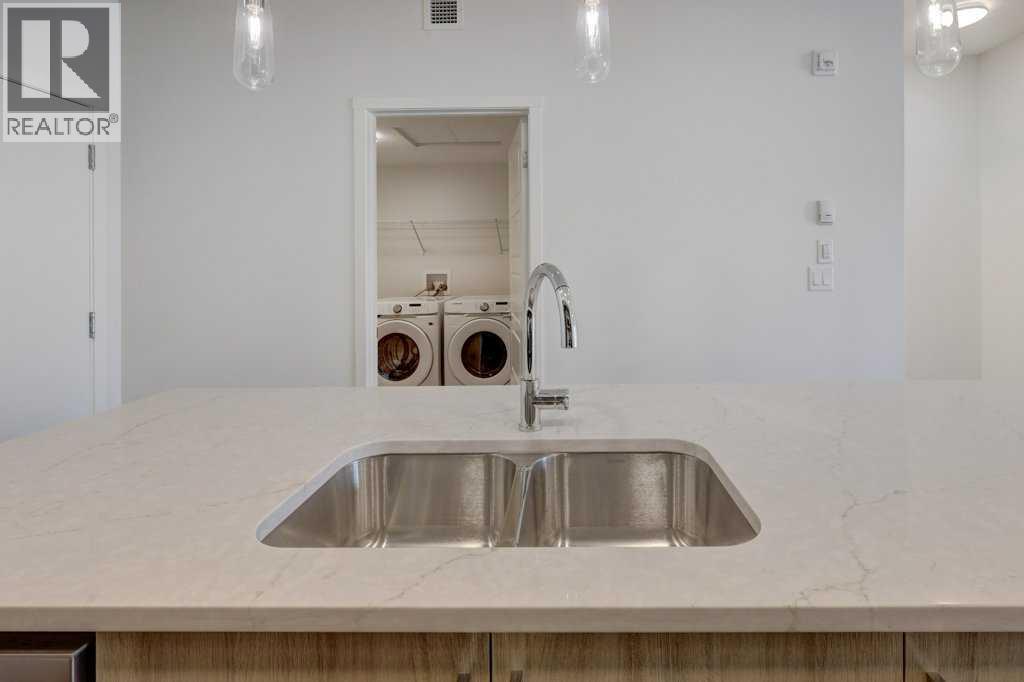 219, 245 Edith Place Nw, Calgary, Alberta  T3R 2C9 - Photo 11 - A2275303