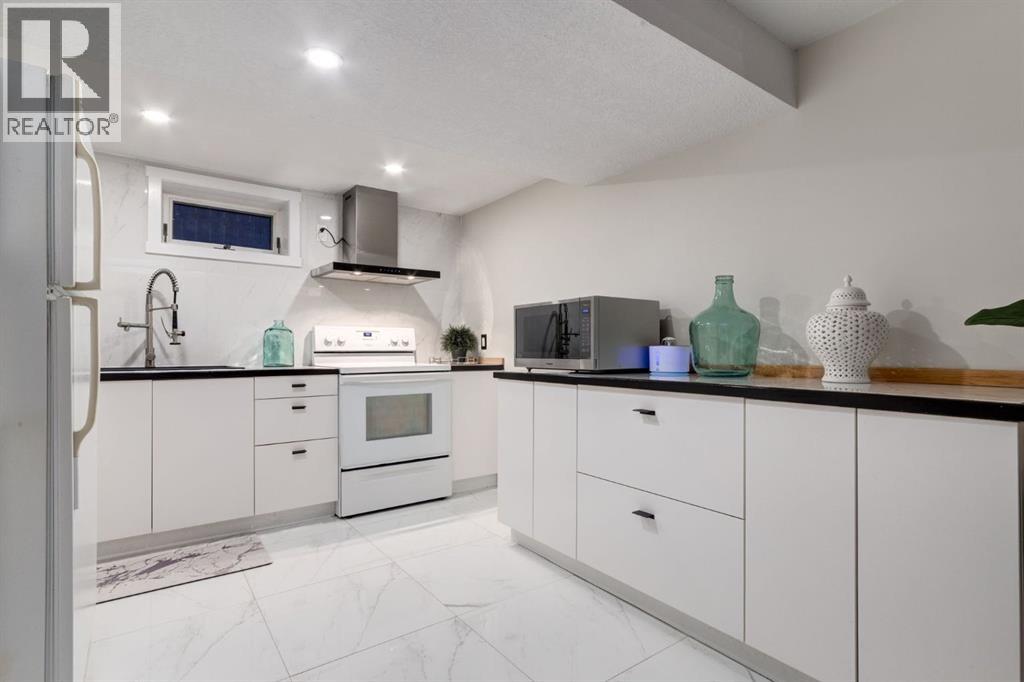 5 Sydney Drive Sw, Calgary, Alberta  T2W 0S7 - Photo 22 - A2269400