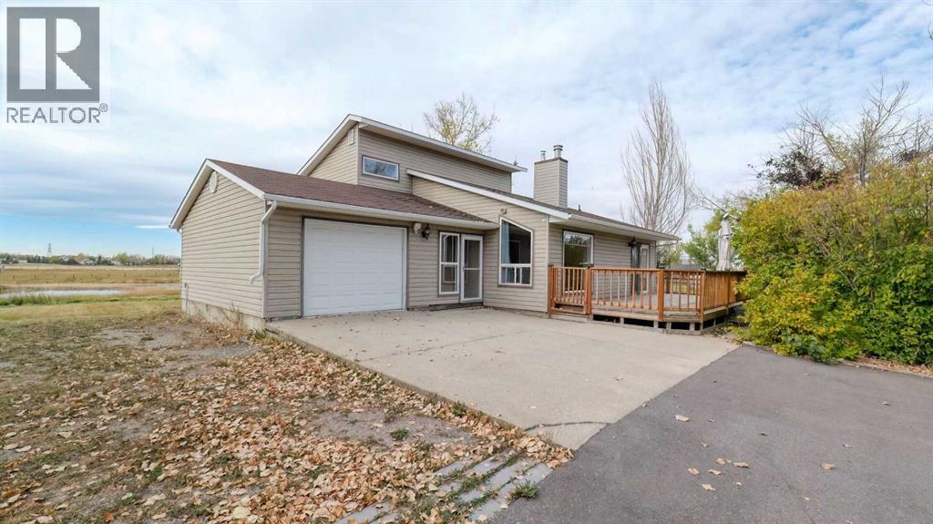 247 Shore Drive, Rural Rocky View County, Alberta  T2M 4L5 - Photo 4 - A2262909