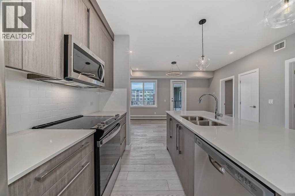 1218, 6 Merganser Drive W, Chestermere, Alberta  T1X 2Y2 - Photo 3 - A2273256