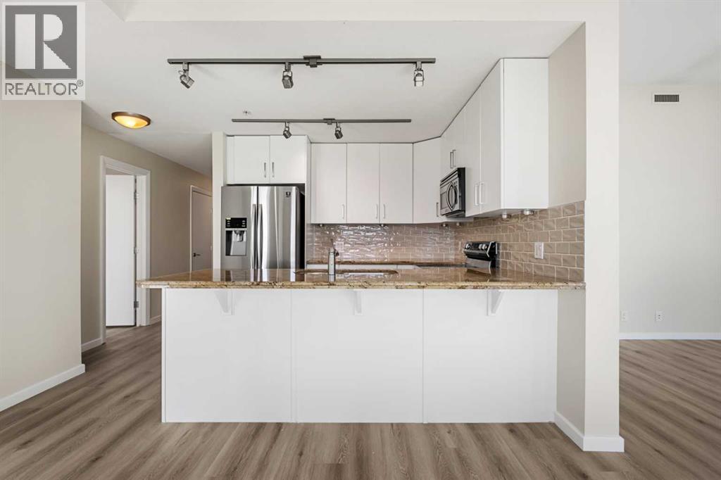 2104, 1410 1 Street Se, Calgary, Alberta  T2G 5T7 - Photo 3 - A2251889