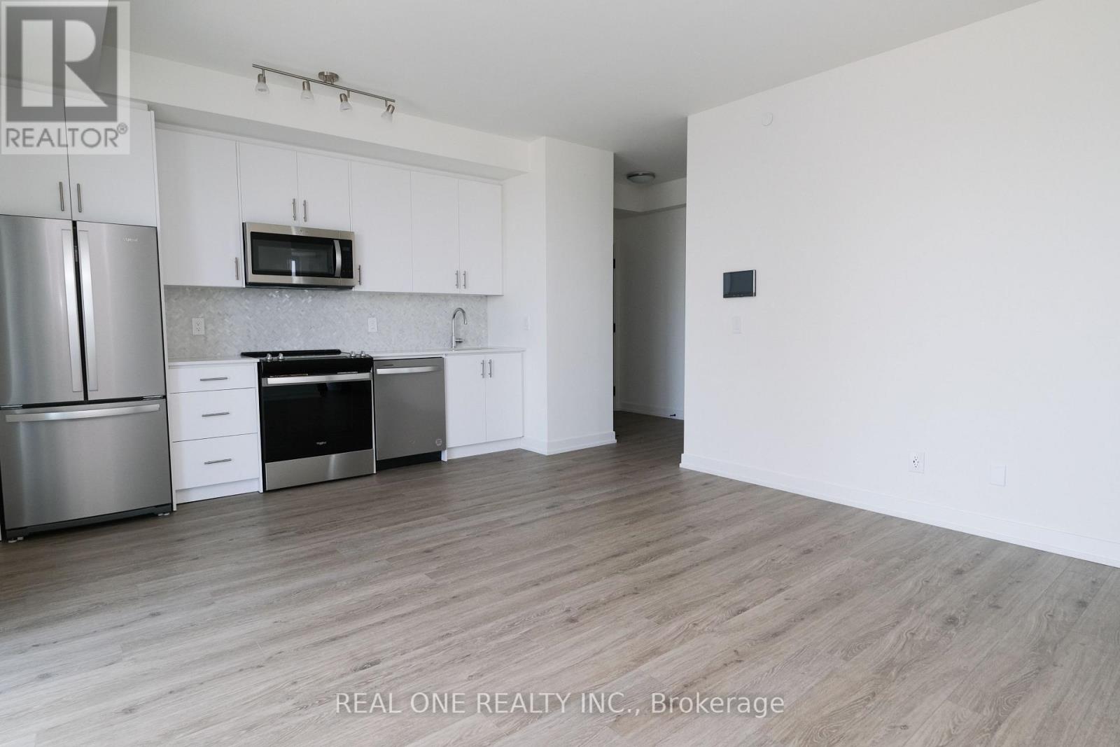 1302 - 335 Wheat Boom Drive, Oakville, Ontario  L6H 7Y1 - Photo 4 - W12644874