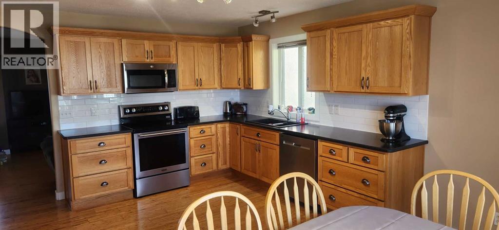 1506 Walter Place, Didsbury, Alberta T0M 0W0 - Photo 12 - A2263096