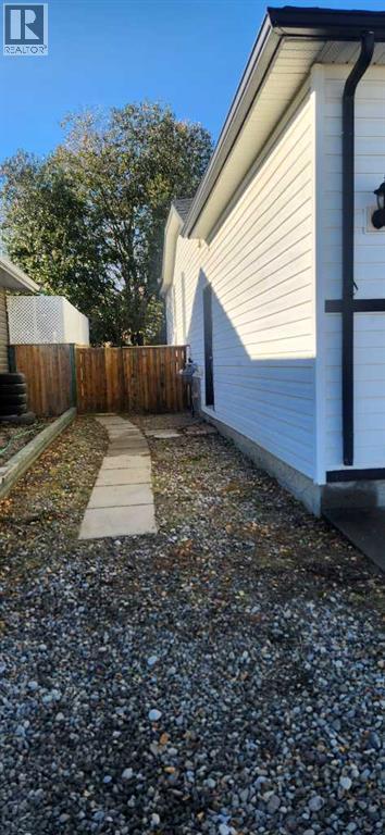 1506 Walter Place, Didsbury, Alberta T0M 0W0 - Photo 3 - A2263096