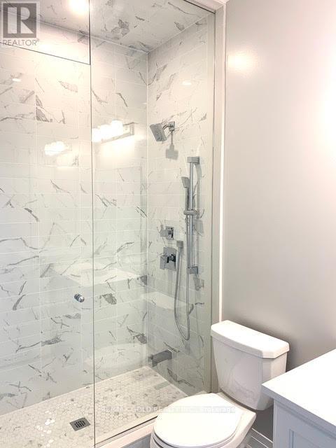 609 - 128 Grovewood Common, Oakville, Ontario  L6H 0X3 - Photo 15 - W12638120