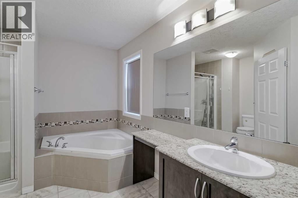 206 Pantego View Nw, Calgary, Alberta  T3K 0N7 - Photo 27 - A2275633