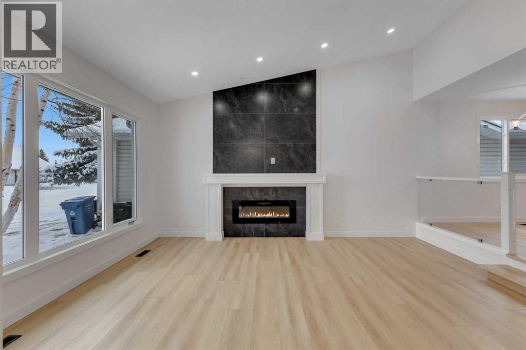 19 Cedargrove Place Sw, Calgary, Alberta  T2W 4T8 - Photo 5 - A2273303