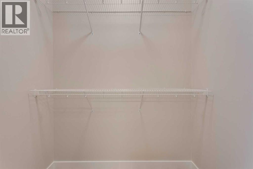 105 Cottageclub Drive, Rural Rocky View County, Alberta  T4C 1B1 - Photo 20 - A2266824