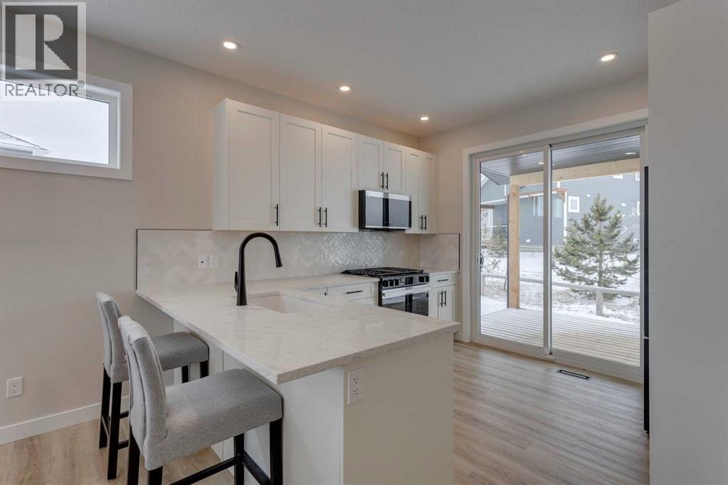 105 Cottageclub Drive, Rural Rocky View County, Alberta  T4C 1B1 - Photo 14 - A2266824