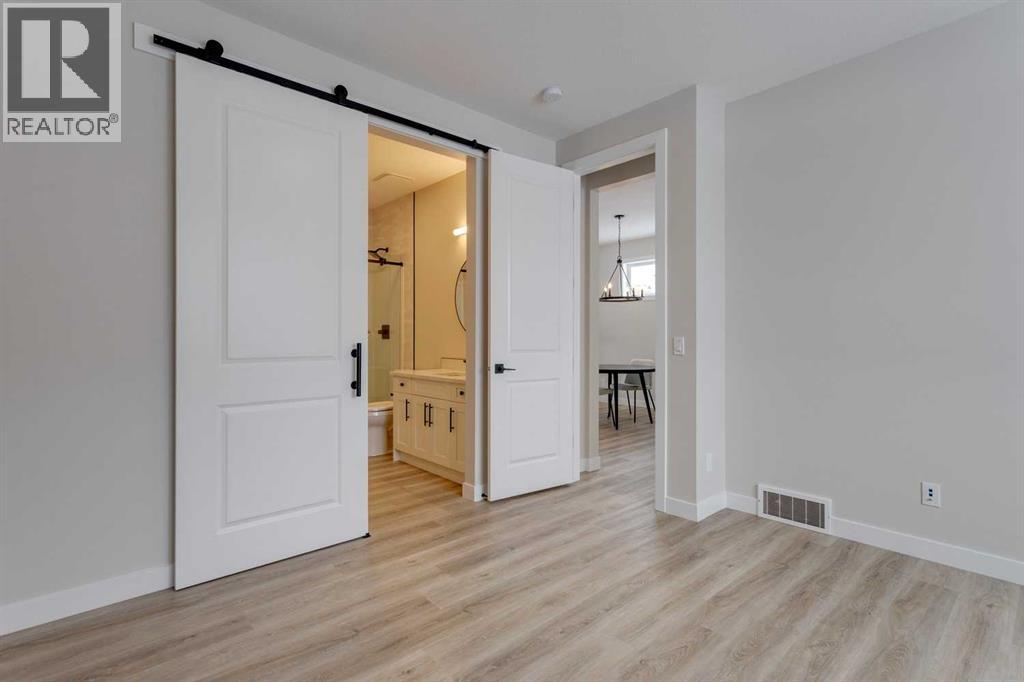 105 Cottageclub Drive, Rural Rocky View County, Alberta  T4C 1B1 - Photo 17 - A2266824