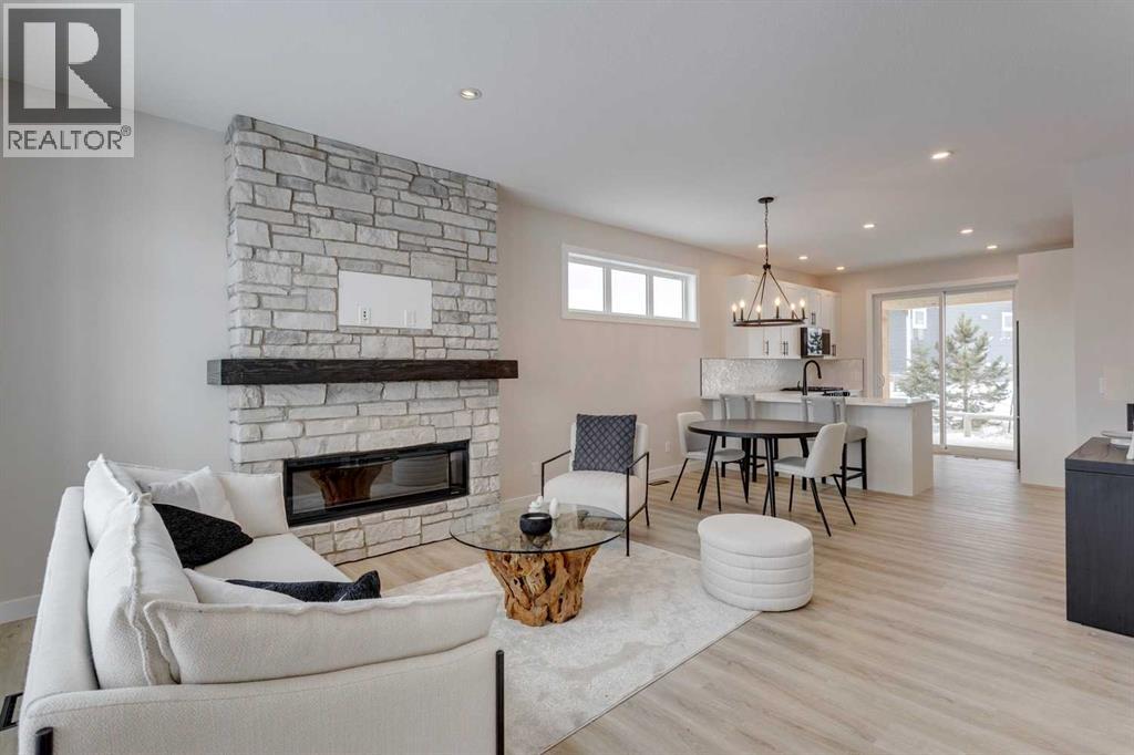 105 Cottageclub Drive, Rural Rocky View County, Alberta  T4C 1B1 - Photo 4 - A2266824